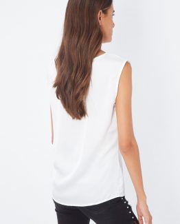 Blusa satinada con flor en el hombro - Tutto Tempo