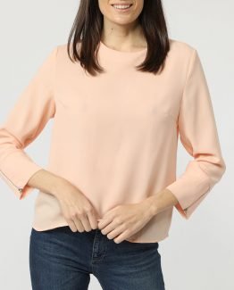 Blusa lisa con cremallera