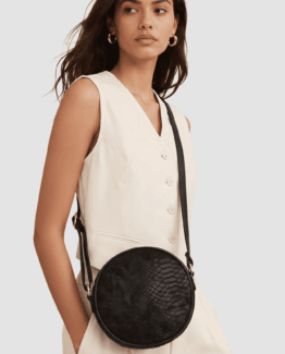 Bolso redondo de imitación ante